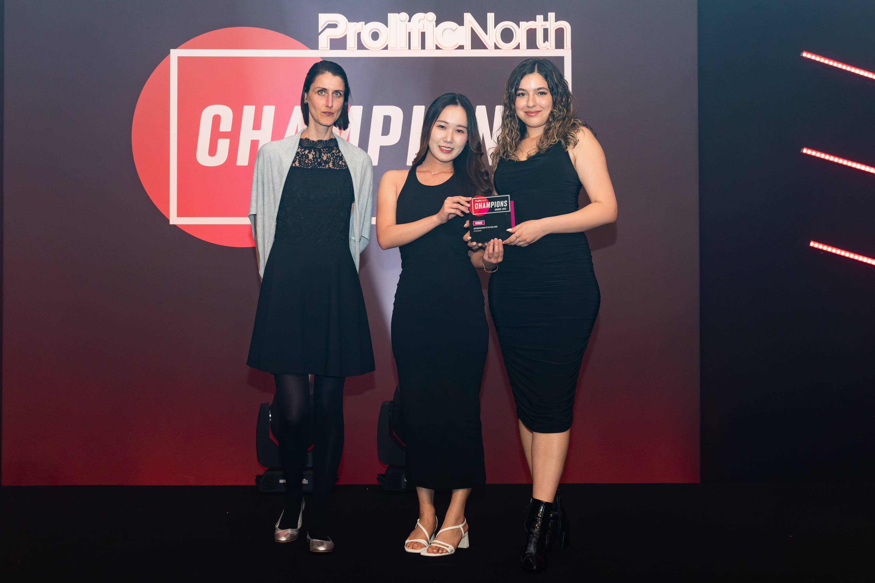 Evoluted's Joyce Lee and Amber Mukerker collect an award at the Prolific North Champions Awards